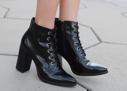 "Stylish ankle boots with a sleek design, featuring a chunky heel and detailed stitching, perfect for fall fashion outfits."