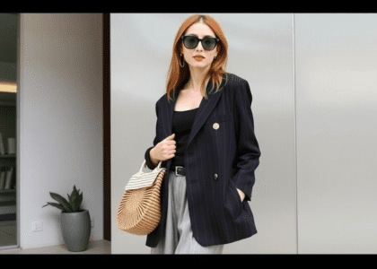 Oversized pinstripe blazer outfit styled for summer lunch, featuring a dressy look with a skirt, perfect for university or dinner events, showcasing a chic and trendy women's fashion ensemble.